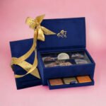 Godiva Belgium 1926 Blue Box filled with assorted luxury chocolates.