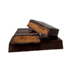 Dark Lotus Dubai Pistachio Chocolate Bar with rich dark chocolate and crunchy pistachio pieces on display.